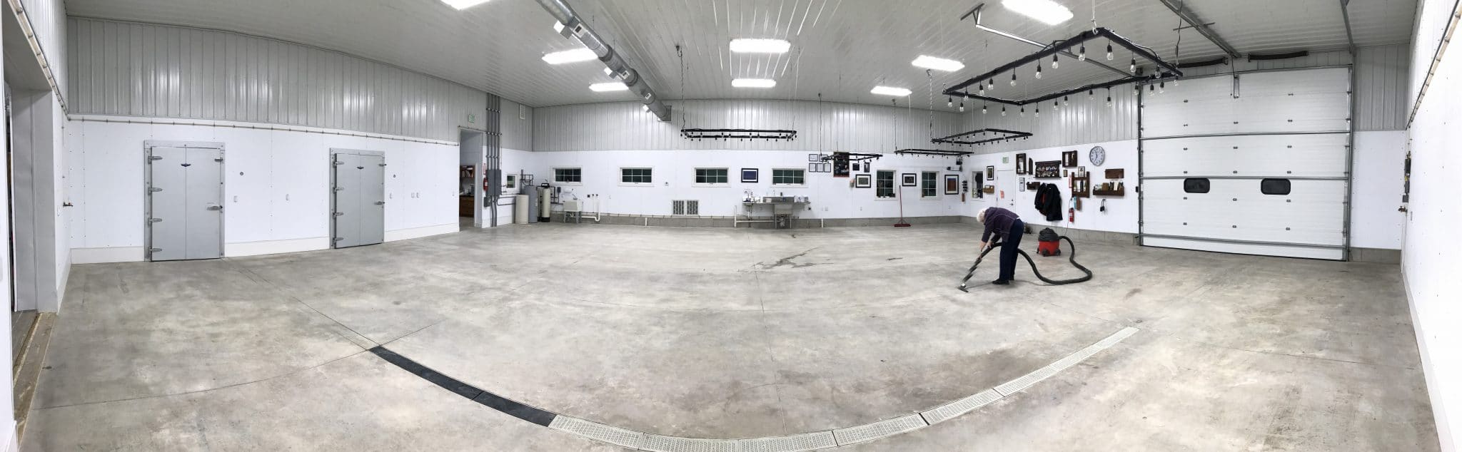 Interior of the Soldier Creek Winery event space during floor preparation