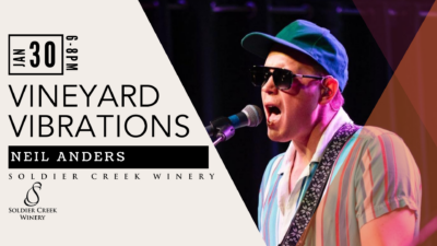 Vineyard Vibrations promotional image for January 30 from 6–8PM at Soldier Creek Winery. Musician Neil Anders performs into a microphone wearing sunglasses, a teal cap, and a striped shirt.